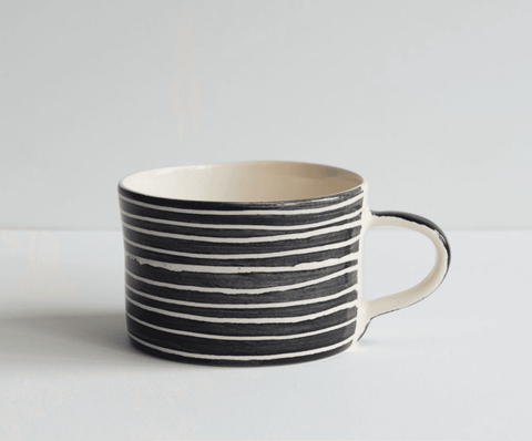 Beautiful Portuguese mugs showcasing traditional designs and colours, perfect for adding charm to your kitchen collection.