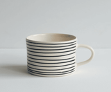 Beautiful Portuguese mugs showcasing traditional designs and colours, perfect for adding charm to your kitchen collection.