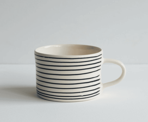 Beautiful Portuguese mugs showcasing traditional designs and colours, perfect for adding charm to your kitchen collection.