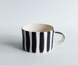 Beautiful Portuguese mugs showcasing traditional designs and colours, perfect for adding charm to your kitchen collection.