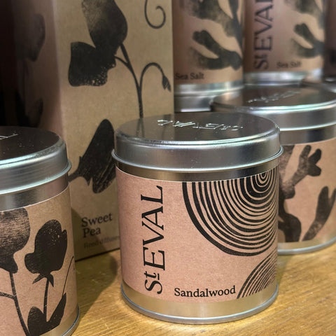 Sandalwood candle with deep, sweet musk and refreshing eucalyptus fragrance for a soothing ambiance