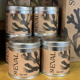 Relaxing sea salt candle emitting a soothing beach-inspired aroma for calming ambiance