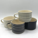 Beautiful Portuguese mugs showcasing traditional designs and colours, perfect for adding charm to your kitchen collection.
