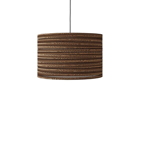 Handcrafted cardboard pendant showcasing eco-friendly design and stylish decor for sustainable living