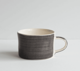 Beautiful Portuguese mugs showcasing traditional designs and colours, perfect for adding charm to your kitchen collection.
