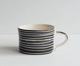 Beautiful Portuguese mugs showcasing traditional designs and colours, perfect for adding charm to your kitchen collection.