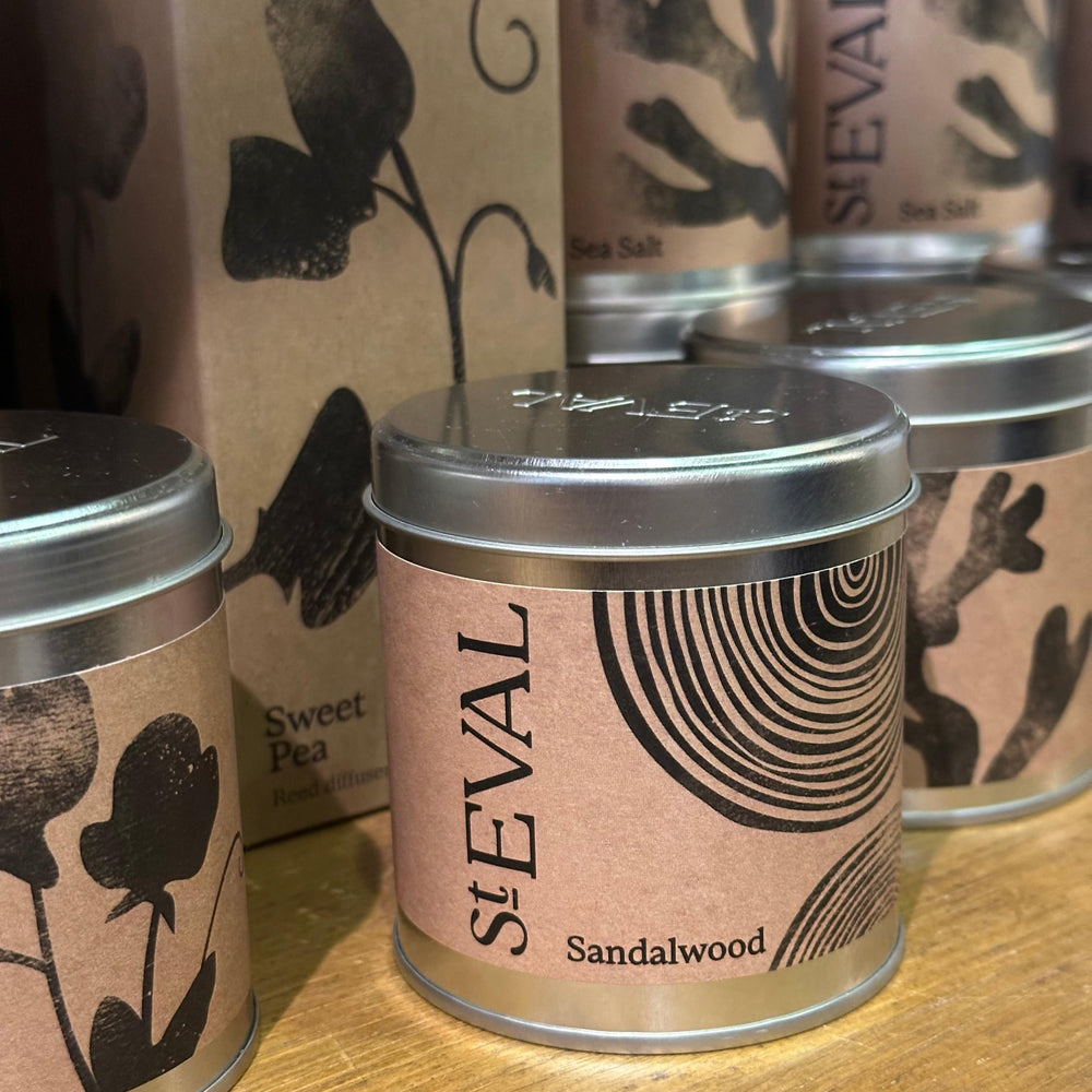 Sandalwood candle with deep, sweet musk and refreshing eucalyptus fragrance for a soothing ambiance