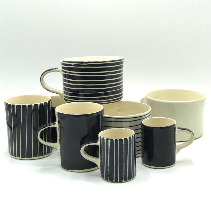 Beautiful Portuguese mugs showcasing traditional designs and colours, perfect for adding charm to your kitchen collection.